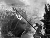 Reichstag parliament building On April 30, 1945, two Soviet soldiers hoisted the red flag on the Reichstag parliament building in Berlin. Even though it is now known that the scene for this photo was actually staged two days later, it remains one of the most famous images of the 20th century, symbolizing the victory over Hitler, the destruction of the Nazi party and the end of the Second World War.