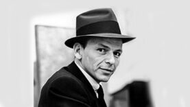 Frank_Sinatra_(1957_studio_portrait_close-up)